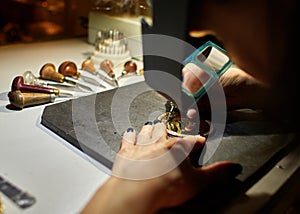 Woman engraver at work.