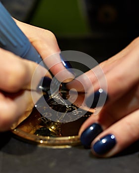 Woman engraver at work.