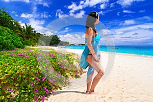 Woman enjoing sun holidays at the beach photo