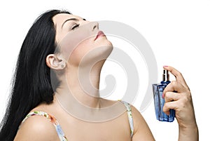 Woman enjoy the fragrance of her perfume