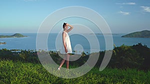 Woman enjoy fresh tropical island landscape view