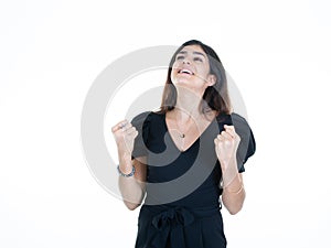 Woman enjoy hands clenched fist happy with joy with raised hands and clenching fists