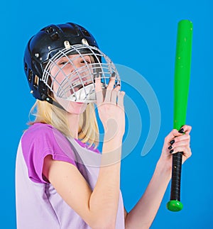Woman enjoy play baseball game. Girl confident pretty blonde wear baseball helmet and hold bat on blue background. Woman