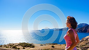 Woman enjoy sea breeze