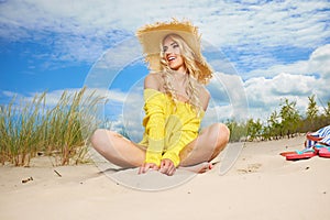 Woman enjoy sun on the beach