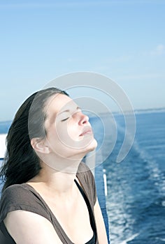 Woman enjoy sun upperdeck