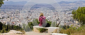 Woman enjoy the view over athens