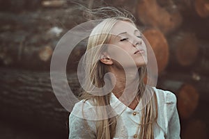 Woman enjoying autumn wind