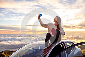 Woman enjoying beautiful cloudscape