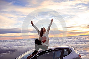 Woman enjoying beautiful cloudscape