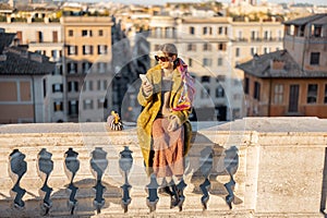 Woman enjoying beautiful morning cityscape of Rome