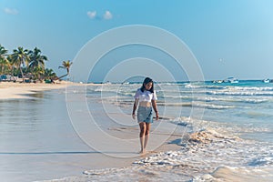 Woman enjoying beautiful Tulum beach Mexico North America