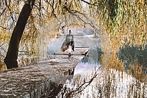 Woman enjoying of beauty autumn season in nature outdoor