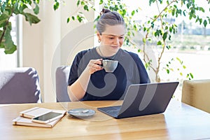 Woman Enjoying Coffee During Work From Home