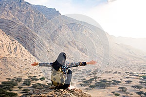 Woman enjoying desert scenery