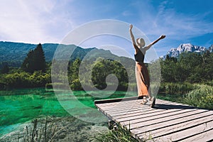 Woman enjoying freedom on nature outdoors. Travel Slovenia Europe