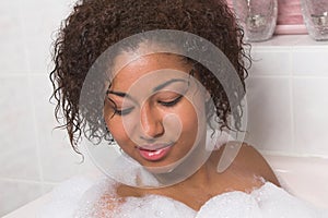 Woman enjoying her bath photo