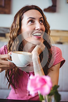 Woman enjoying her cup of coffee