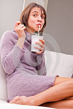 Woman enjoying her noodles in relax