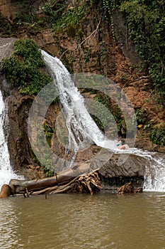 Woman Enjoying herself at the Waterfall known as Cachoeira Paraiso do Cerrado