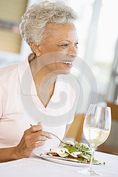 Woman Enjoying meal, Mealtime With A Glass Of Wine