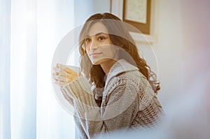 Woman enjoying morning coffee