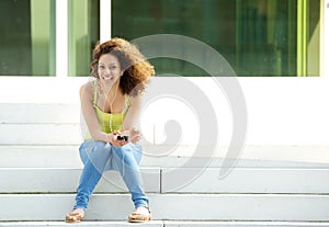 Woman enjoying music with earphones
