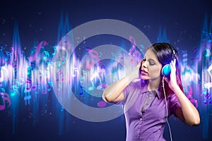 Woman enjoying in music