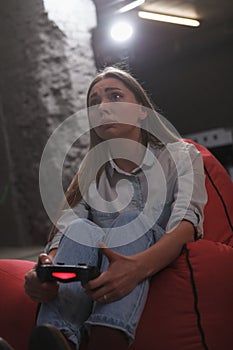 Woman enjoying playing video games