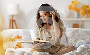 woman enjoying reading book