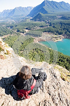 Woman enjoying rewarding view of Rattlesnake Ledge Trail