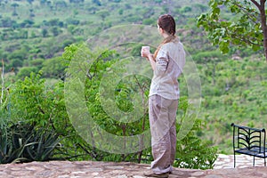 Woman enjoying savanna views