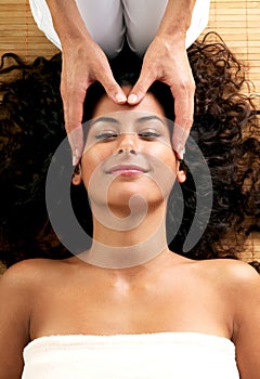 Woman enjoying a Scalp massage