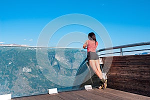 Woman enjoying scenics from Stegastein Viewpoint