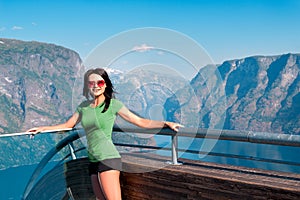 Woman enjoying scenics from Stegastein Viewpoint