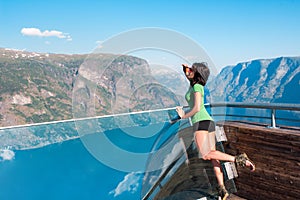 Woman enjoying scenics from Stegastein Viewpoint