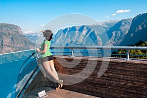 Woman enjoying scenics from Stegastein Viewpoint