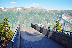 Woman enjoying scenics from Stegastein Viewpoint