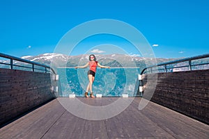 Woman enjoying scenics from Stegastein Viewpoint