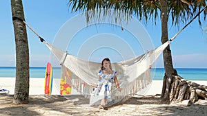 Woman enjoying serene tropical beach vacation