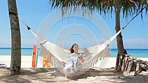 Woman enjoying serene tropical beach vacation