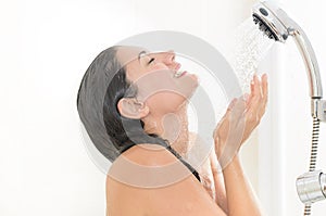 Woman enjoying a shower photo