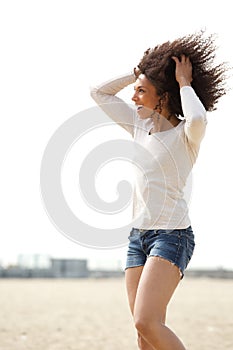 Woman enjoying summer at the beach