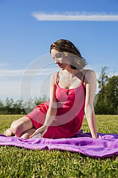 A woman is enjoying the sunny day