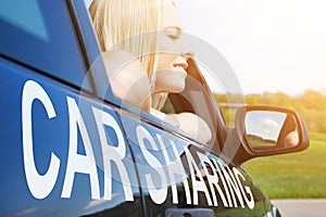 Woman Enjoying Traveling In Car Sharing Service