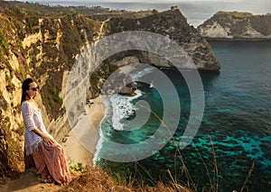 Woman enjoying view of Diamond Bay, Nusa Penida island, Indonesia