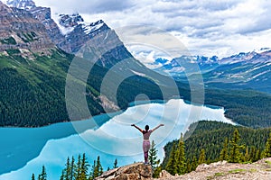 Woman enjoying the view of Peyto Lake, Alberta, Canada