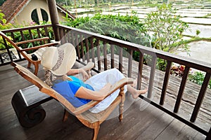 Woman enjoying view of rice fields