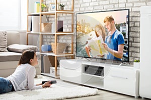 Woman Enjoying Watching Television