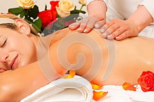 Woman enjoying wellness back massage